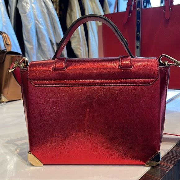 MICHAEL KORS
Manhattan Md TH SCHOOL Crackled Metallic Leather SATCHEL
Crimson - Picture 11 of 16